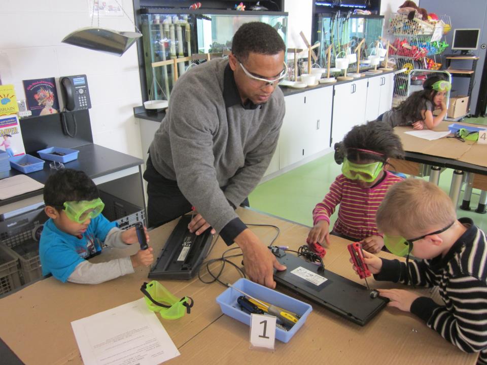 Children fixing keyboard